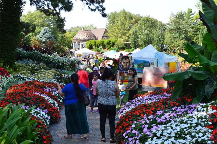 Guests browse at Art in the Garden