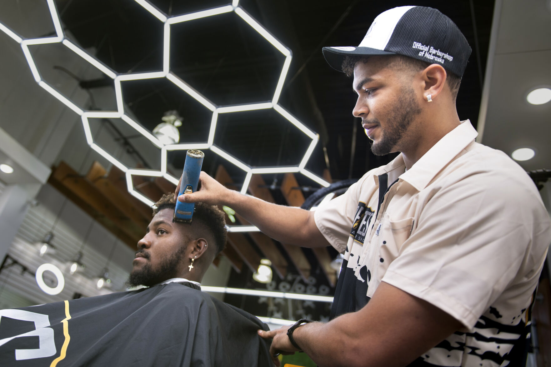 25 year old barber opens first shop in Lincoln s Gateway Mall