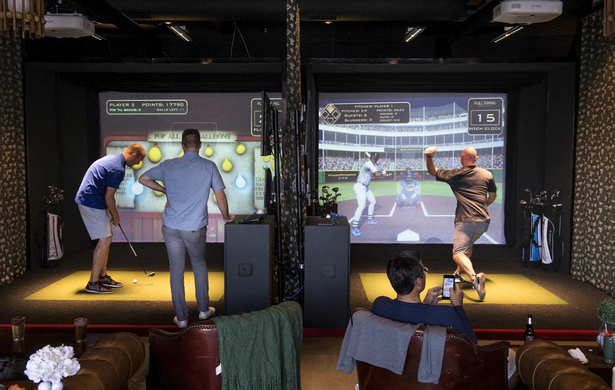 Graduate Lincoln Shows Off New Golf Simulators Local