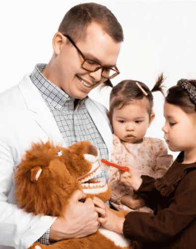Dr. Isaacson with kids (1).png