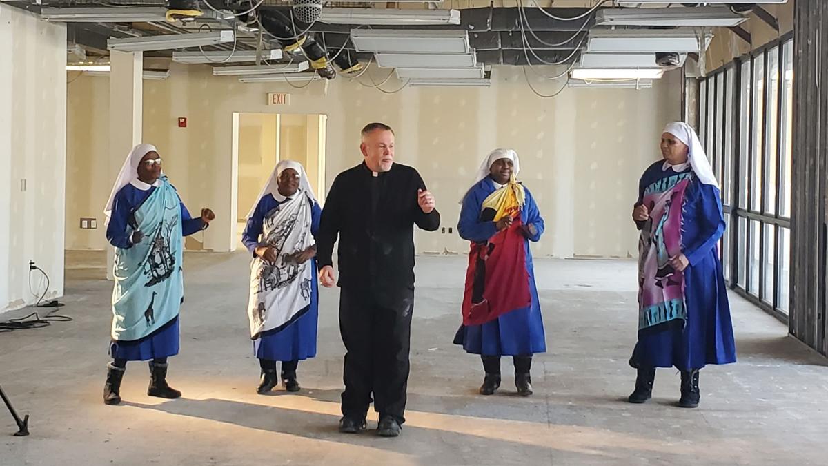 dancing priest