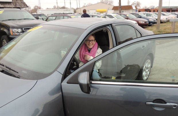 Kortnie about to drive away in new car