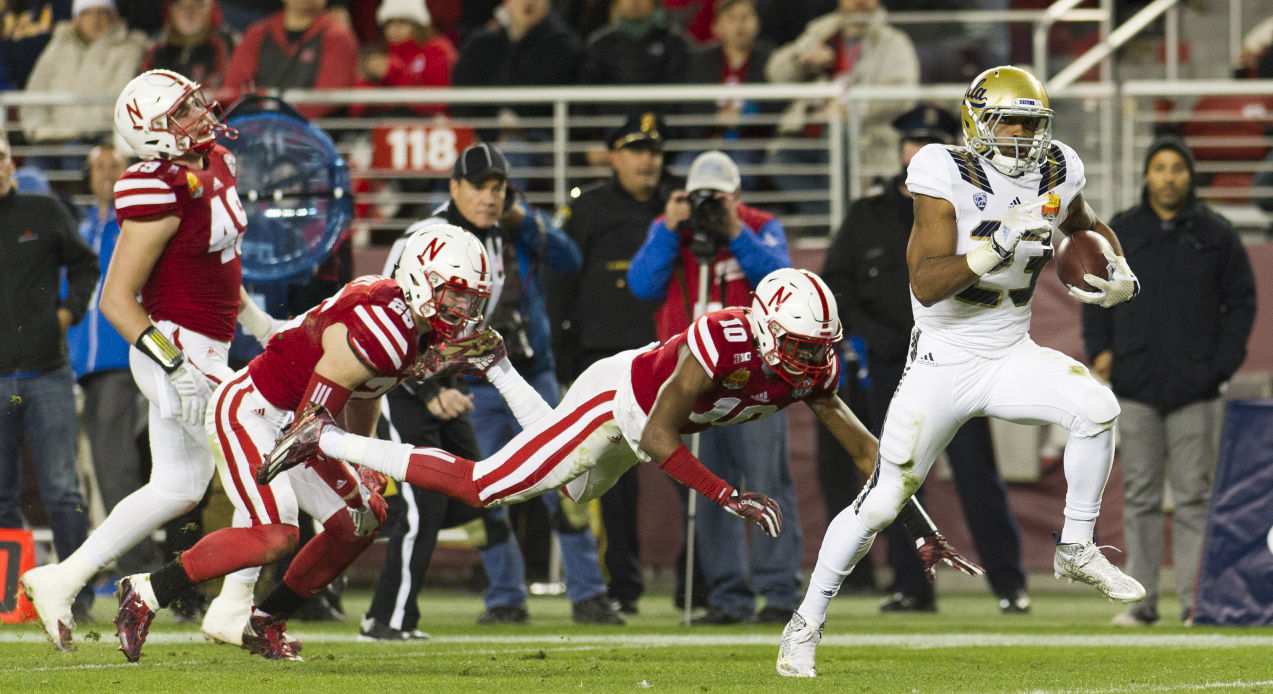 Photos: Huskers Hold Off Bruins In Foster Farms Bowl | Football ...