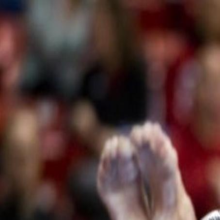 Grandma' Nathe glad she stayed with NU 's gymnastics program