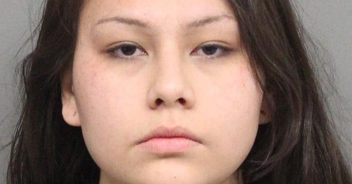 Lincoln woman arrested after she clawed officer in the face, police say