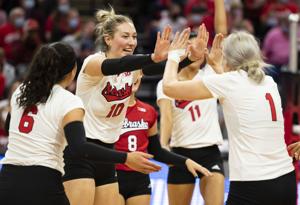 Nebraska volleyball players cheer on campers at Unified Volleyball Camp