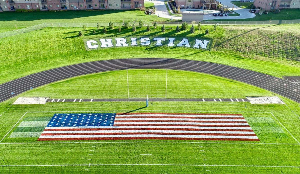 Painting the end zones Lincoln Christian dad honors veterans, supports