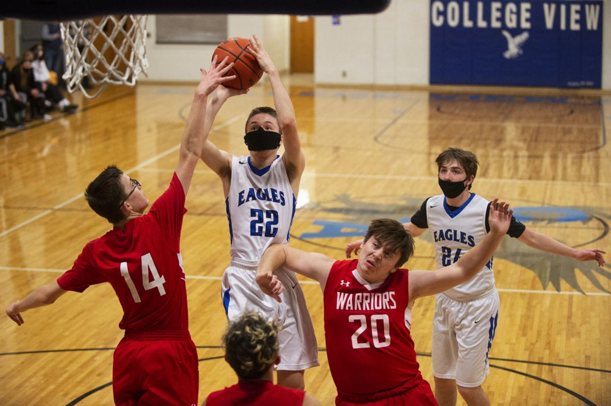 Photos College View boys breeze past Whiting, Iowa