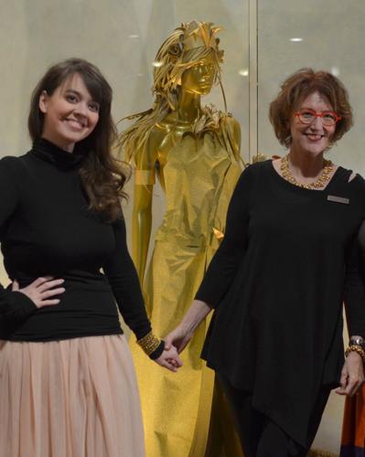 Nicole Battelle Van Hook (left) and Margaret Berry with “Corn Goddess”