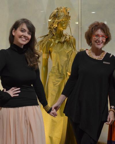 Nicole Battelle Van Hook (left) and Margaret Berry with “Corn Goddess”
