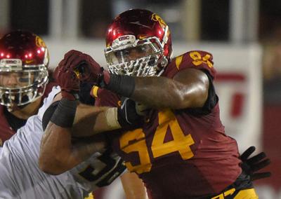 Leonard Williams, Chris Adcock
