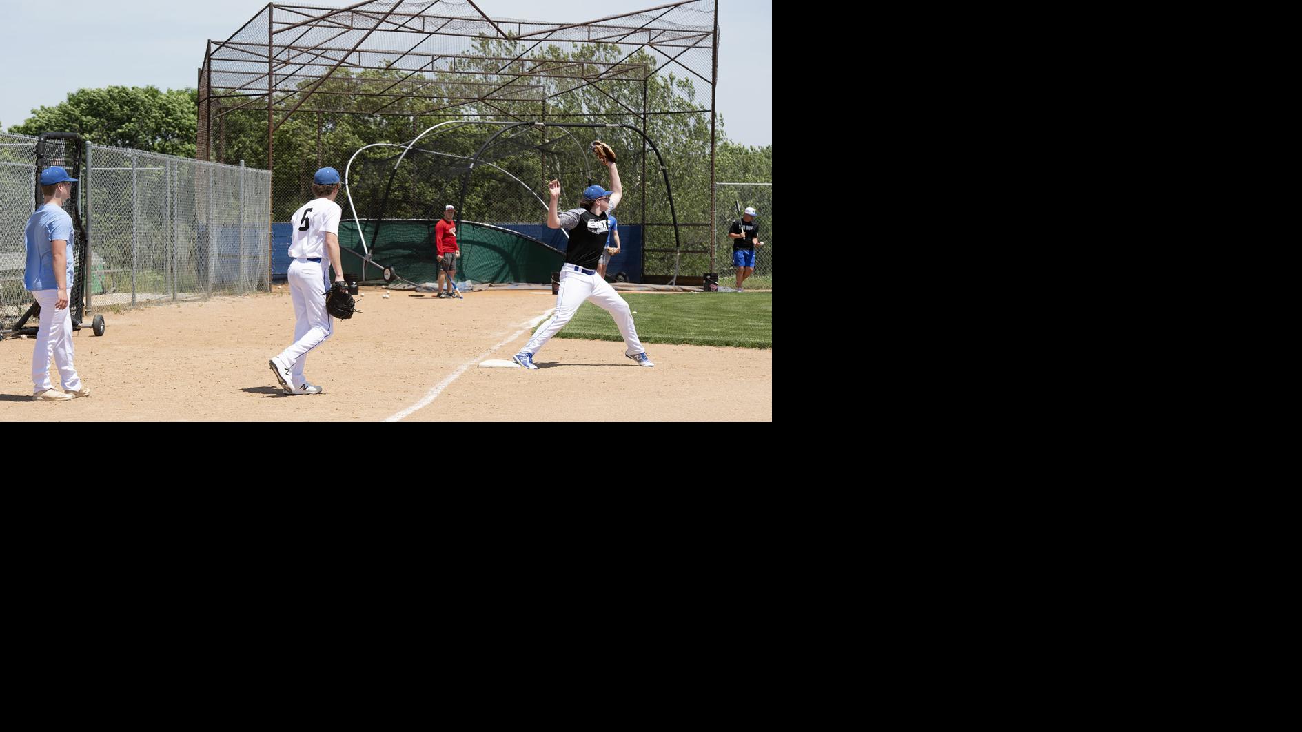 Photos Lincoln East athletes take the field on first day of baseball
