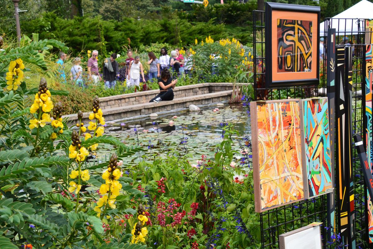 Colorful guests pass through 5th annual Art in the Garden event