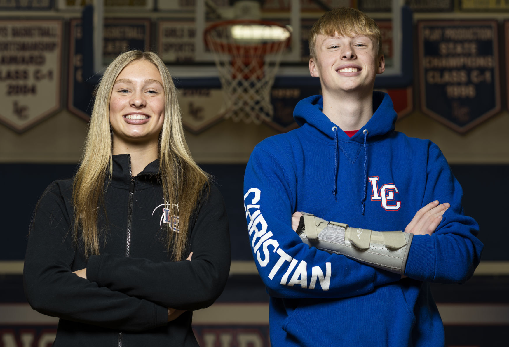 Lincoln Christian s Addie Ben Ehlers support each other after