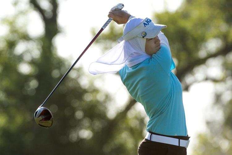 SPORTS GLF-FEMALEGOLFER-HIJAB 1 SA