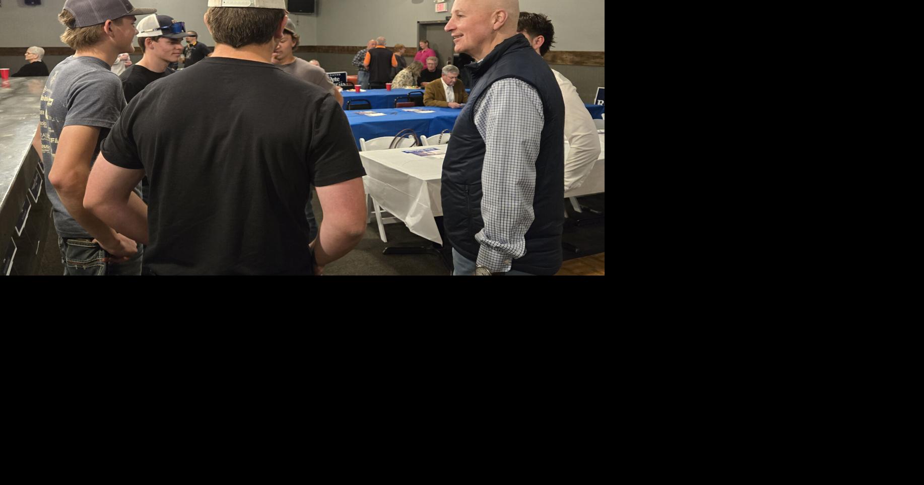 Image for Ricketts bags a turkey during Gage County campaign stop