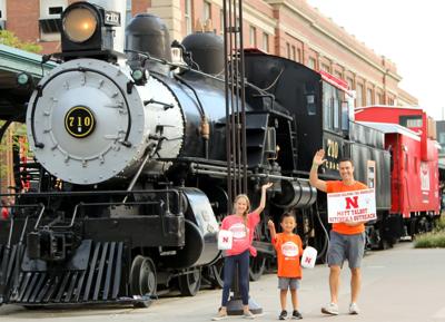 Doug Foral volunteers with daughter Ada and son Milo