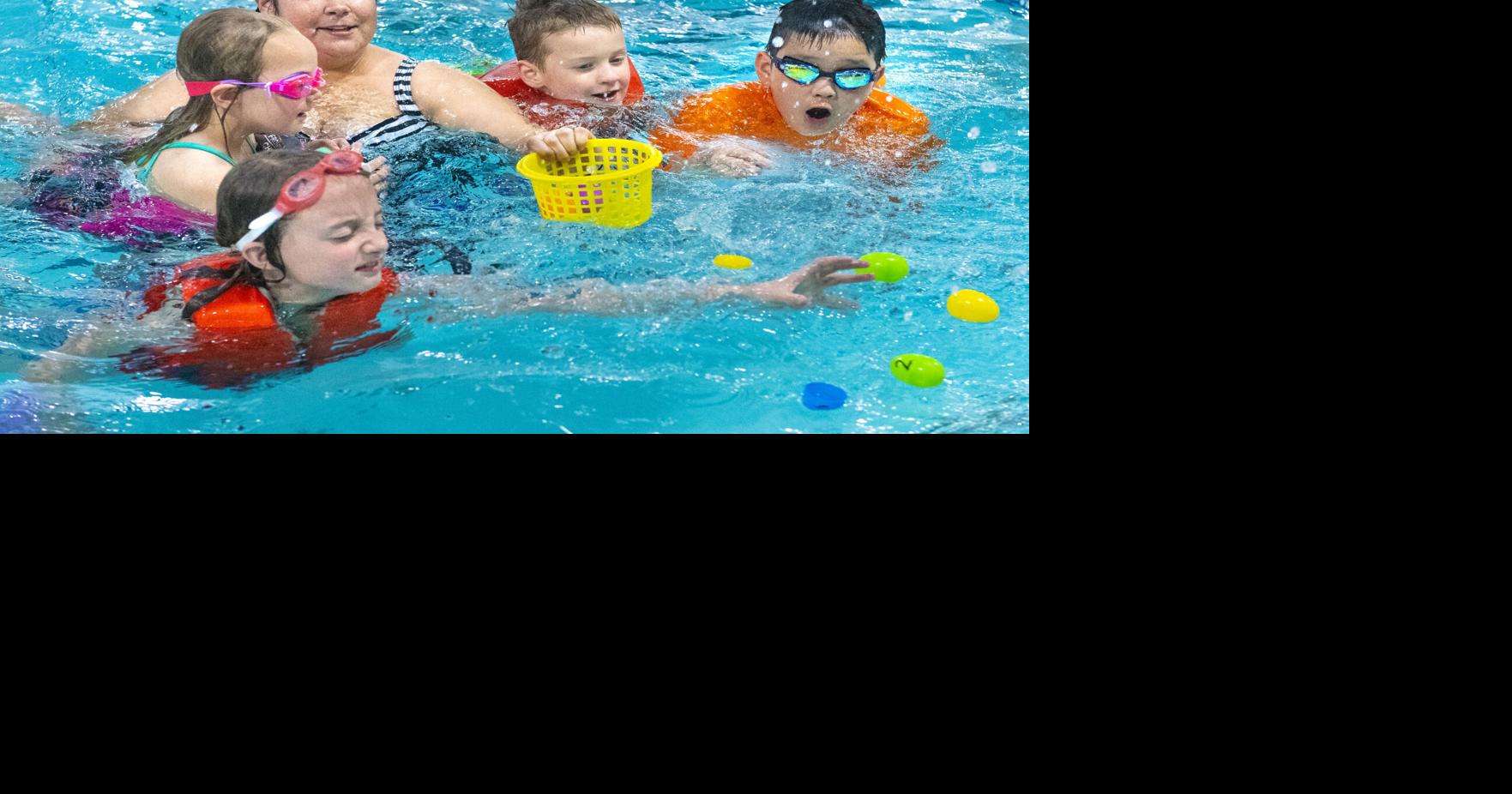 Northeast YMCA hosts pool Easter egg hunt