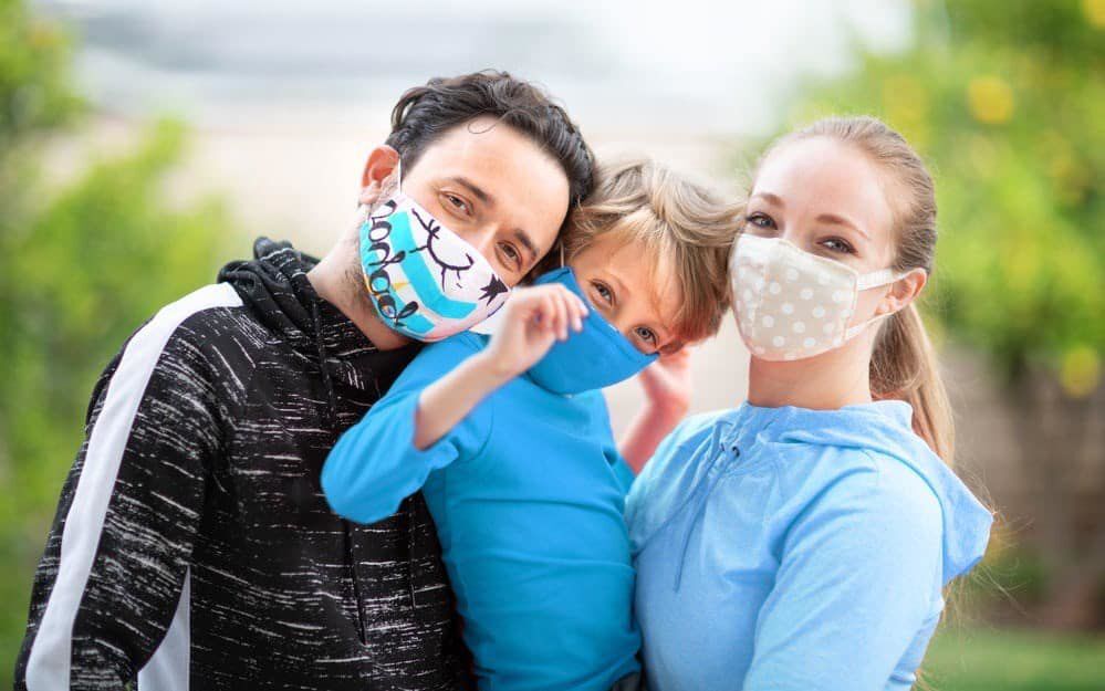 Family wearing facemasks