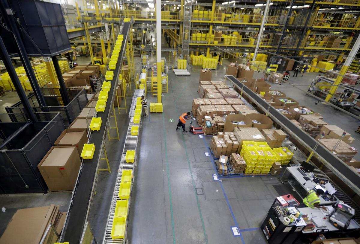 How Humans And Robots Work Side By Side In Amazon Fulfillment Centers Investment Journalstar Com