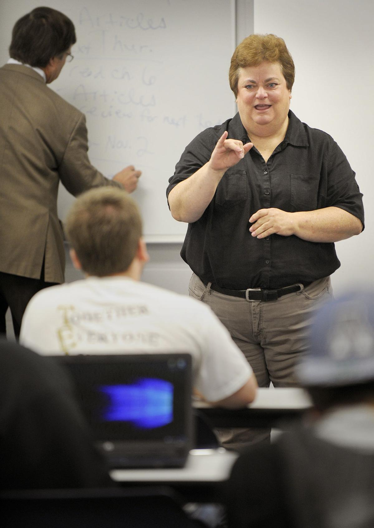 New rules would raise bar for paid sign language interpreters