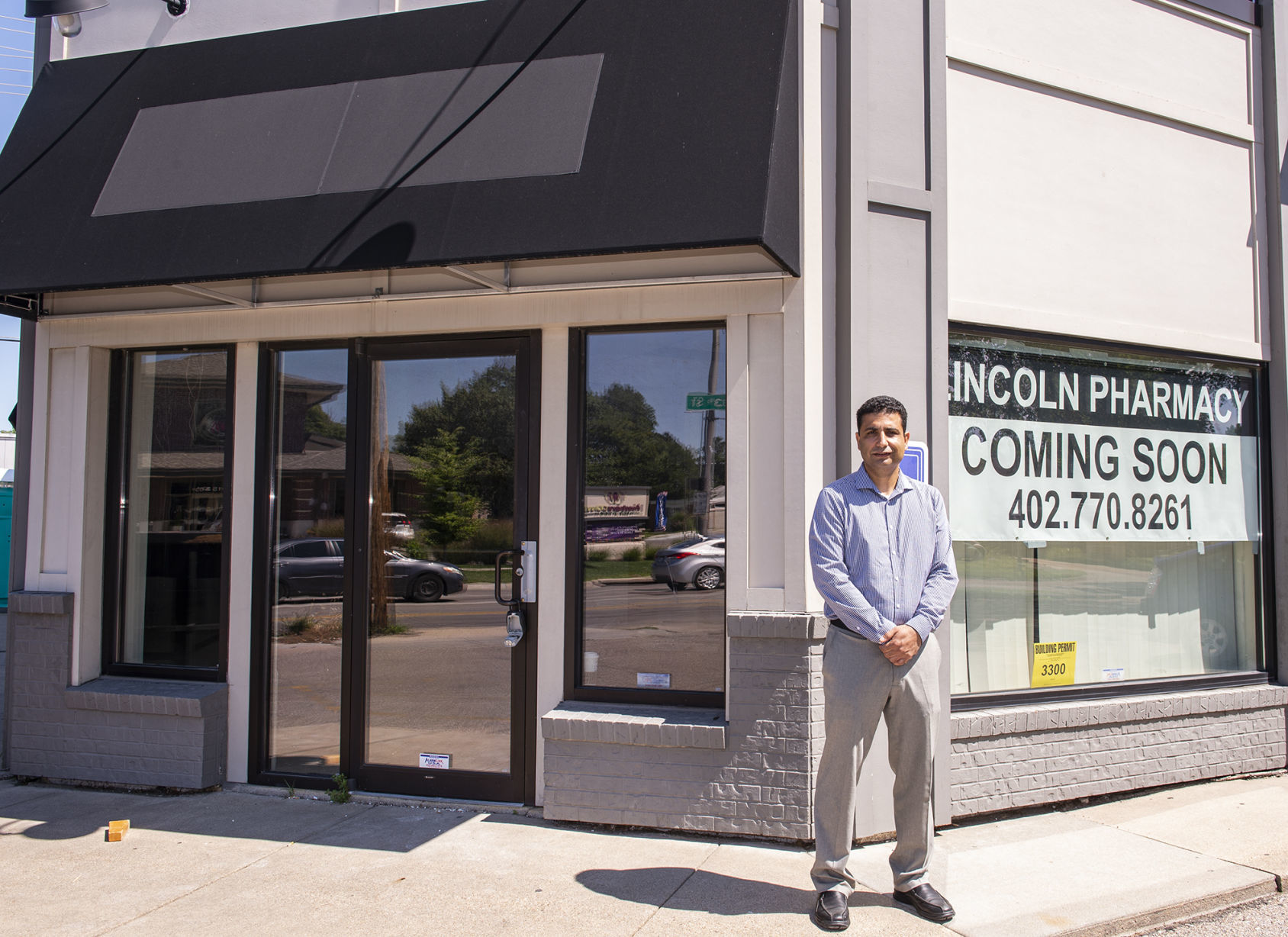 Once an Afghan refugee pharmacist now opening his own store in