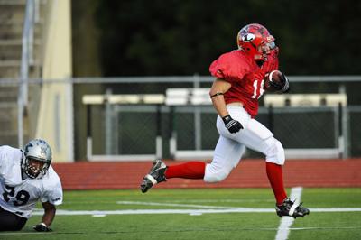 Taylor Dixon Runs Away From The Kansas Defense To Score During The Eight Man All Star Football Game Sa Ay Dixon The Offensive Most Valuable Player For Taylor Dixon Runs Away From The Kansas Defense To Score During The Eight Man All Star Football Game Sa Ay Dixon The Offensive Most Valuable Player For