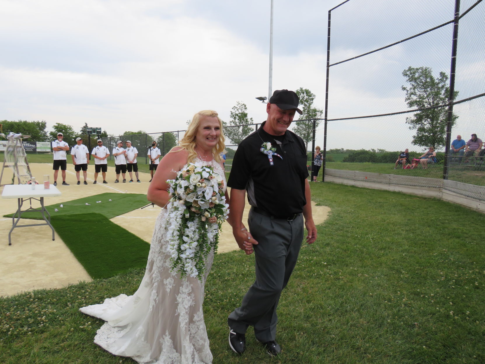 Beatrice couple marries in baseball-themed wedding