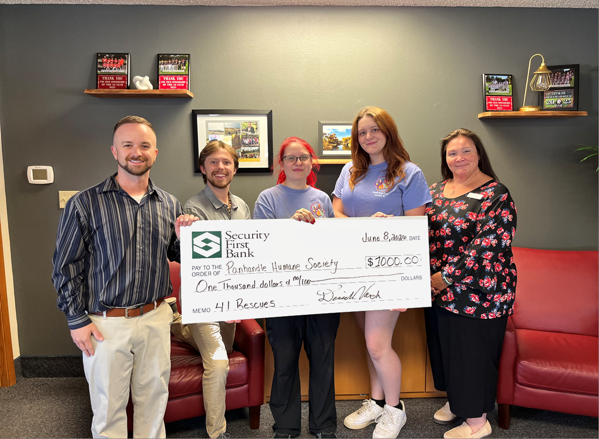 Security First Bank donates $1,000 to Panhandle Humane Society