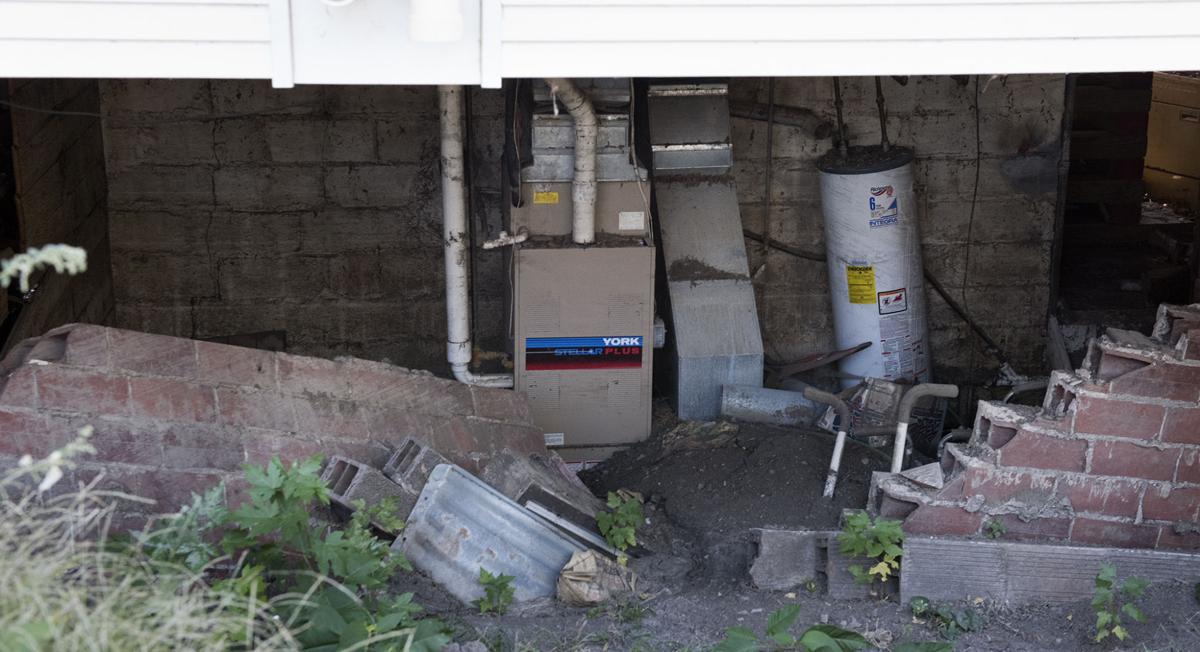 DeWitt works to help struggling flood victims before winter Nebraska