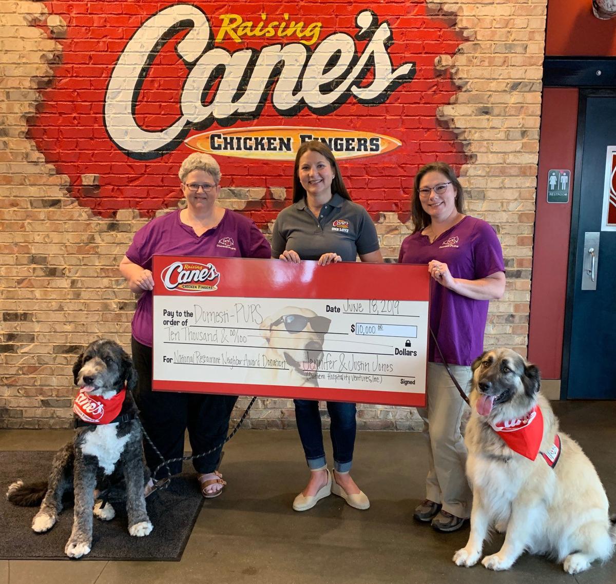 Raising Cane S Donates 10 000 To Domesti Pups Thanks For Giving Journalstar Com