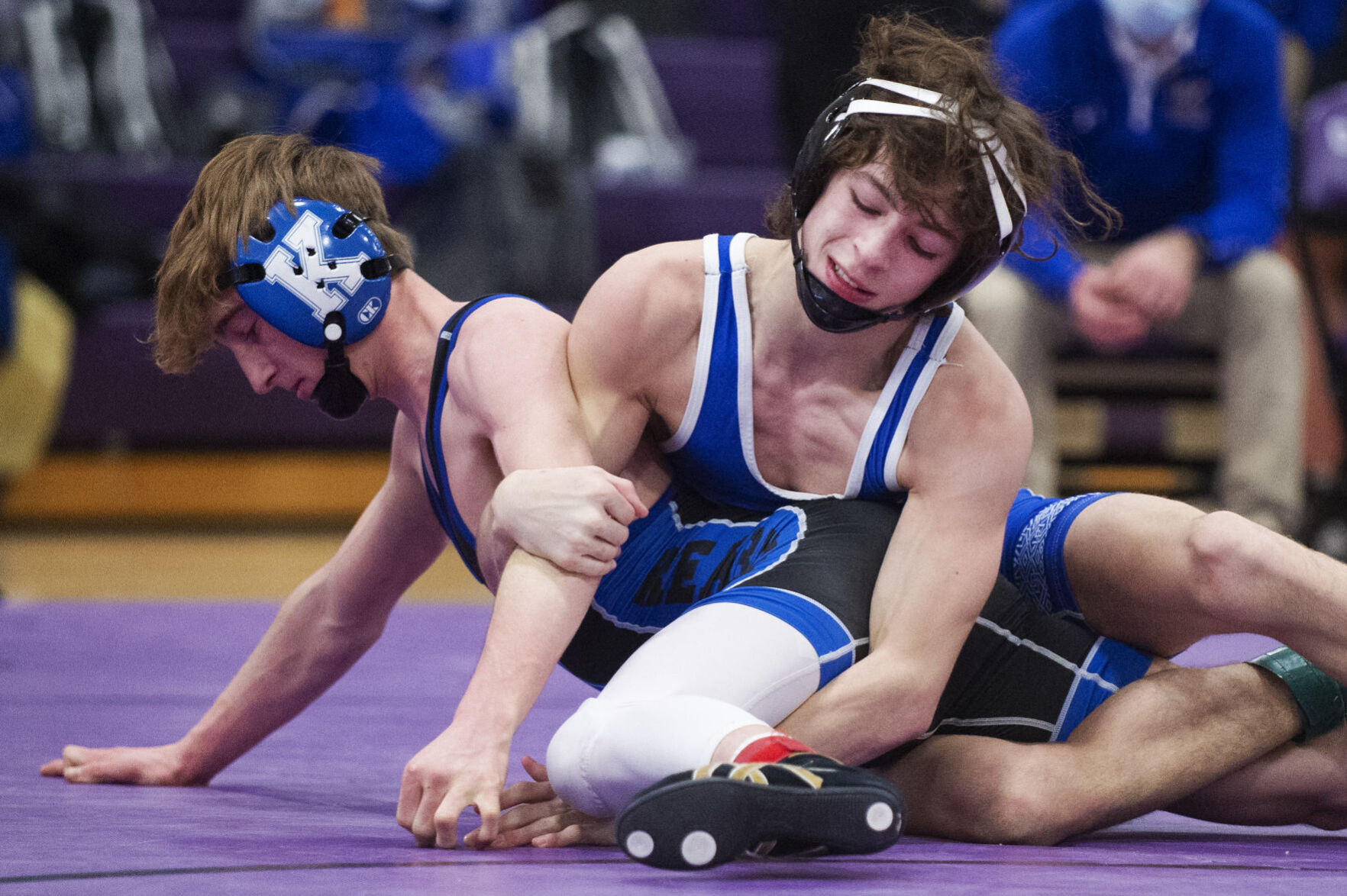 District wrestling roundup Spartans send nine to state after strong day; Pius X qualifies seven