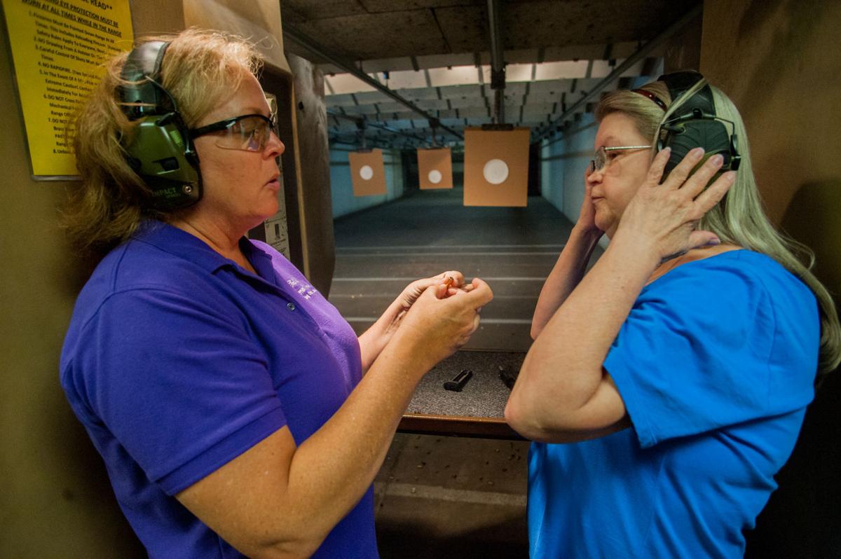 Women, guns Well armed and growing Local