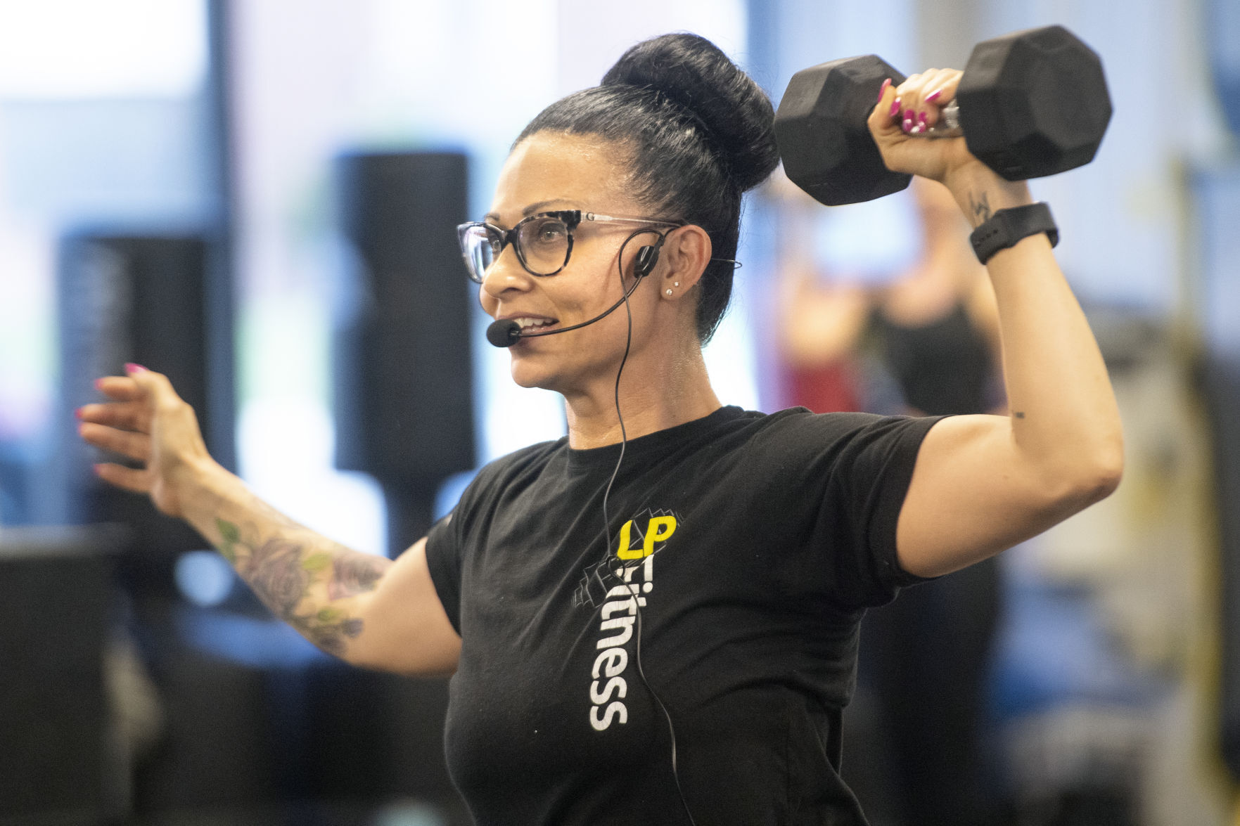 LP Fitness in northeast Lincoln works out staying connected while