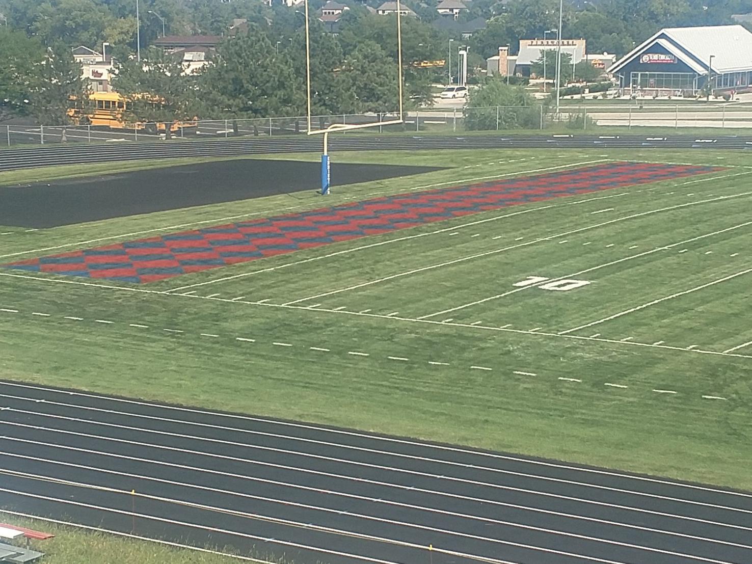 Photos Painting football field