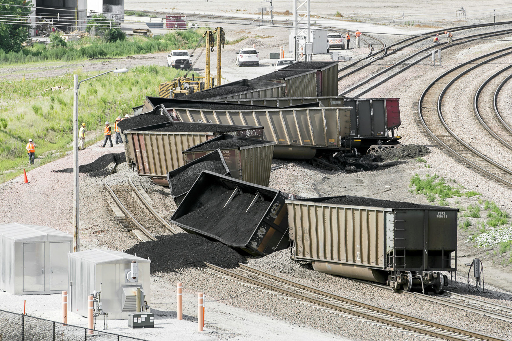 Coal cars off the track near arena