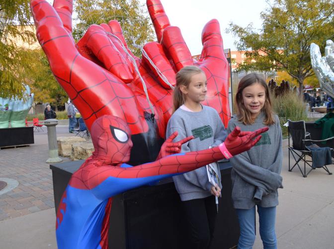 Spiderman (aka Charles Moravec Jr.) with sisters Grace and Lyla Badgett