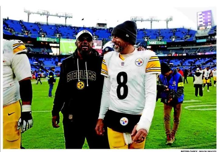 TOMLIN ENJOYS LIFE OFF FIELD