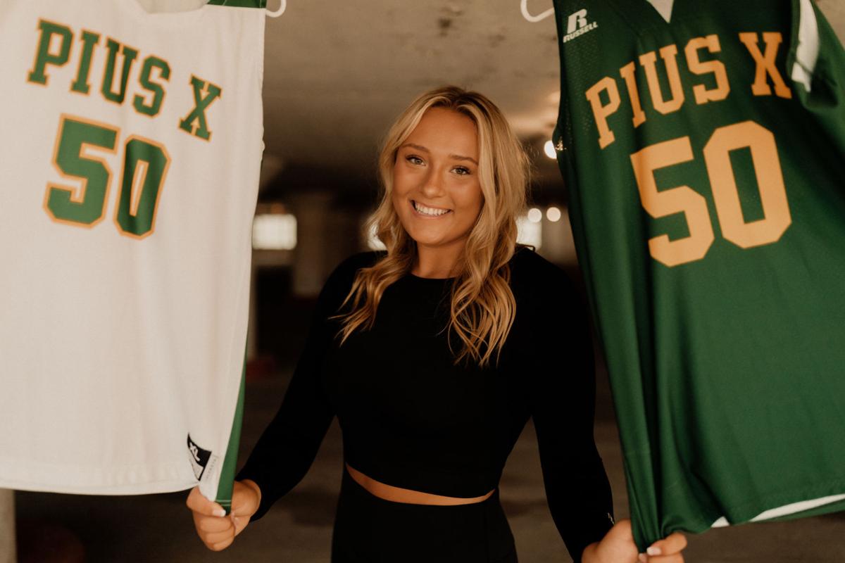 Alexis Markowski with basketball jerseys