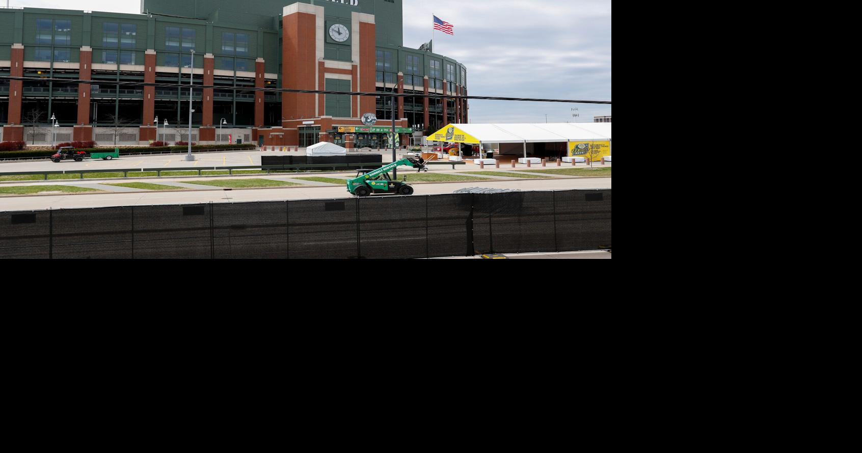 A forklift drives along Lombardi Avenue inside the NFL Draft perimeter on Sunday, April 27, 2025, at Lambeau Field in Green Bay,