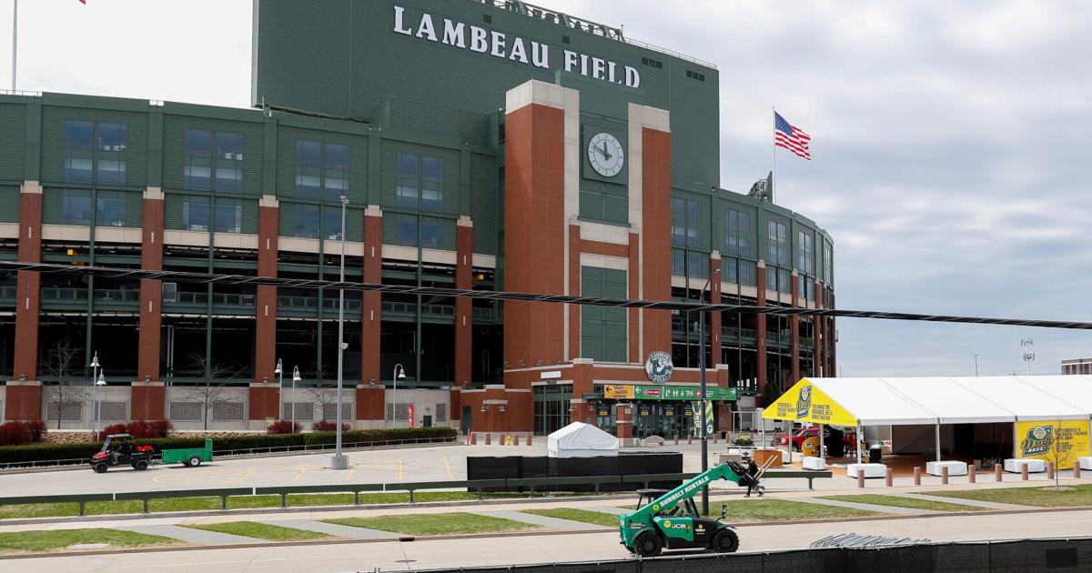 A forklift drives along Lombardi Avenue inside the NFL Draft perimeter on Sunday, April 27, 2025, at Lambeau Field in Green Bay,