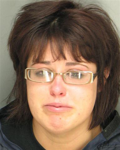 Woman charged with fleeing injury accident