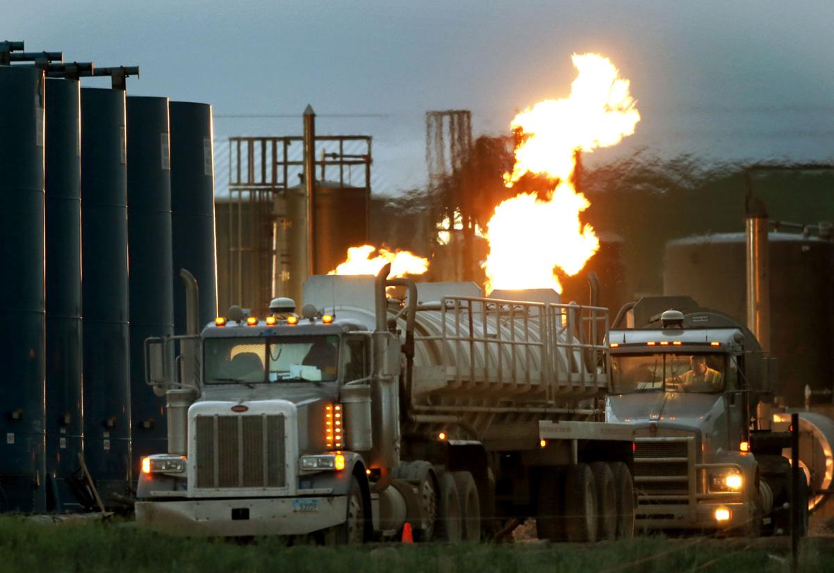 APTOPIX Oil Boom Photo Gallery