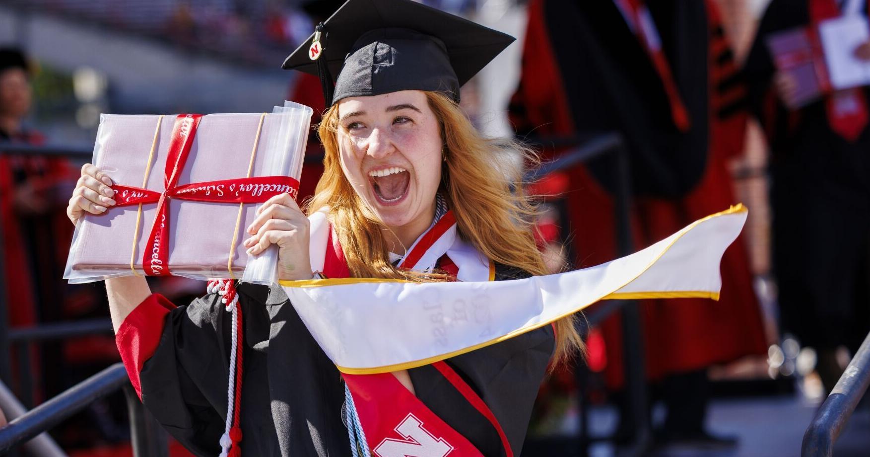 UNL grads cross the stage to receive diplomas, some for the first time - Vimarsana News