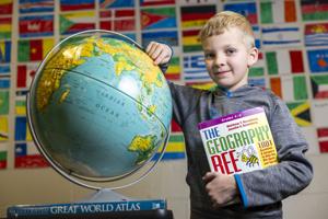 Lincoln student shares passion for geography through handmade flag mural