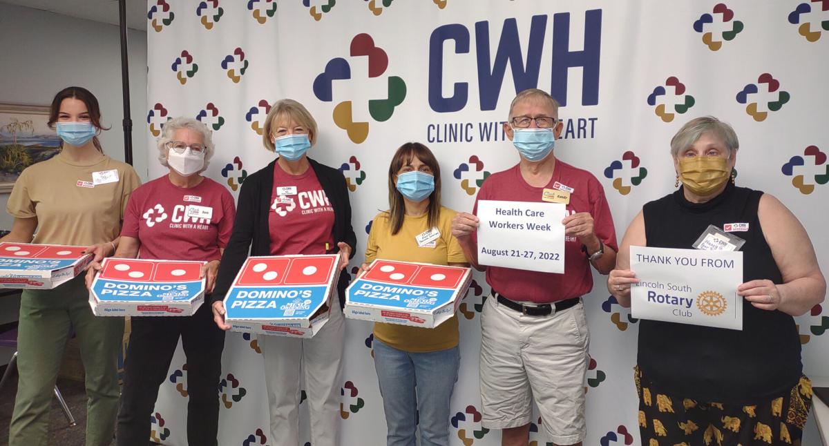 Clinic with a Heart volunteers honored with a pizza dinner
