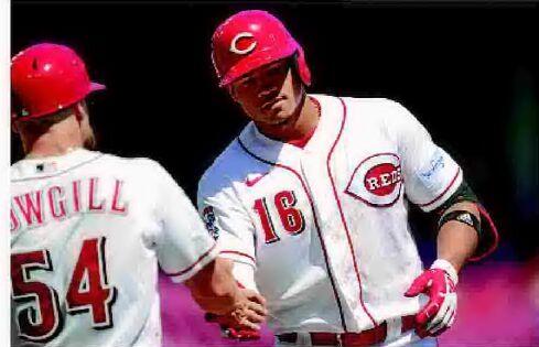 Cubs, Reds split divisional twin bill