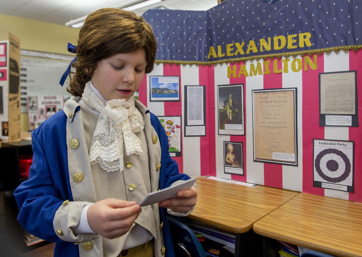 St. Michael fifthgraders bring famous Americans to life with wax