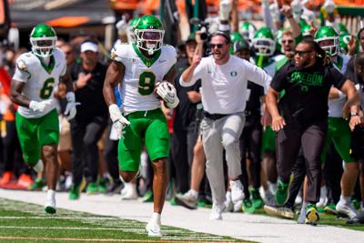 Oregon inside linebacker Devon Jackson scores off a pick-six as the Oregon Ducks face the Oklahoma State Cowboys on Sept. 12, 2026, at Boone Pickens Stadium in Stillwater, Oklahoma.