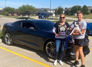 Car show raises over $1K for 2 charities.